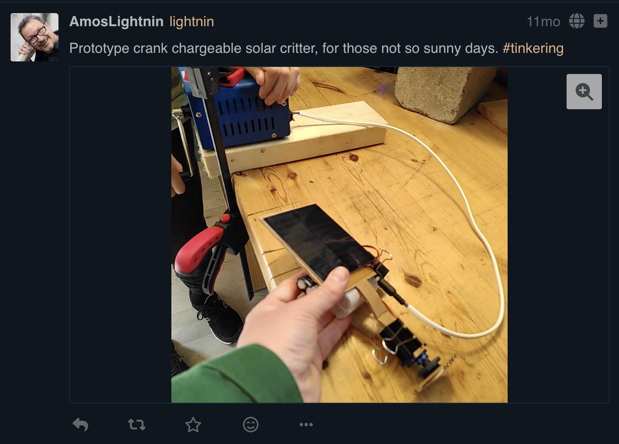Still frame from a demonstration video showing how to crank charge the prototype.